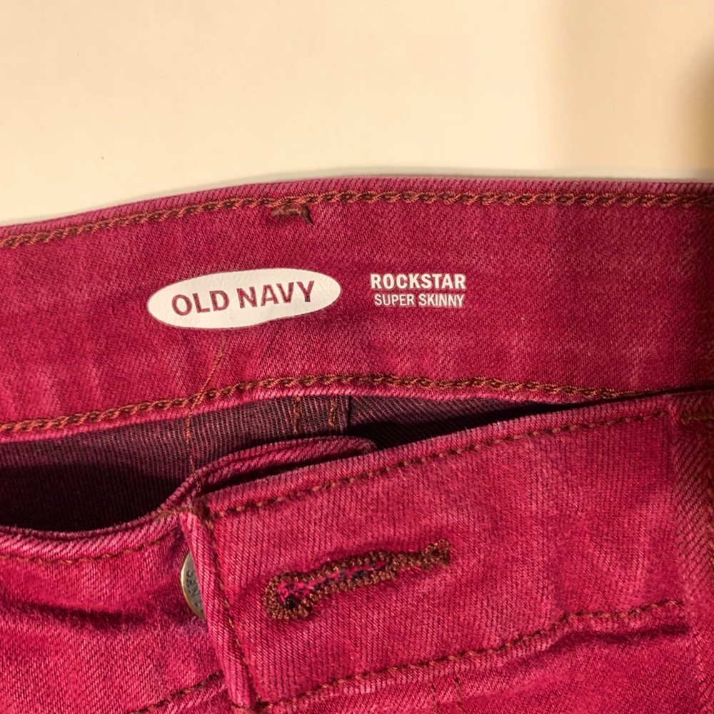 Old Navy Super Skinny Rockstar Cranberry Colored Jeans.